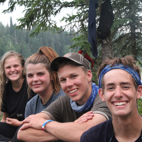 group of teens smiling for camera