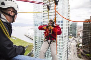 Brett Wilson Rappelling over the edge event