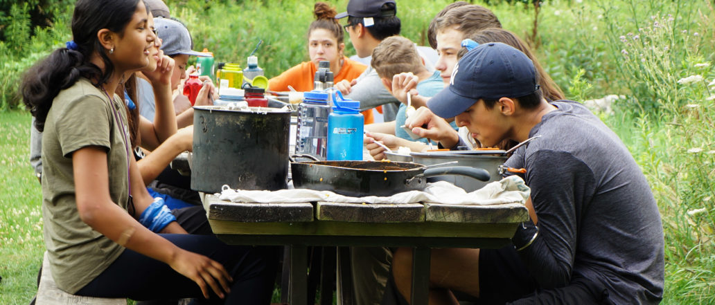 students enjoy a hot meal