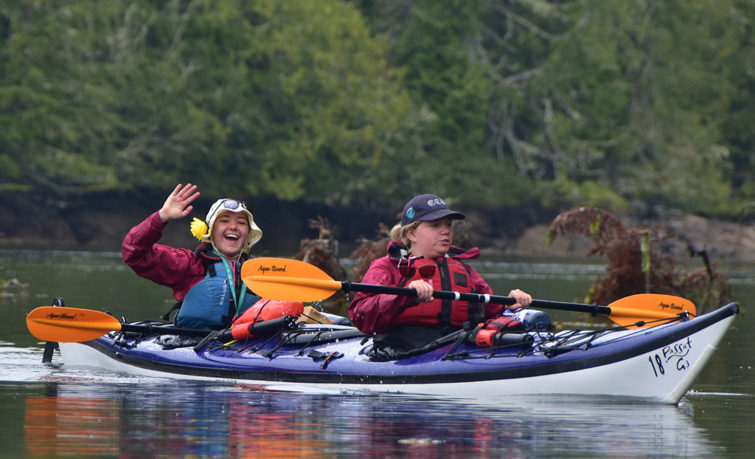 Two people in a kayak.