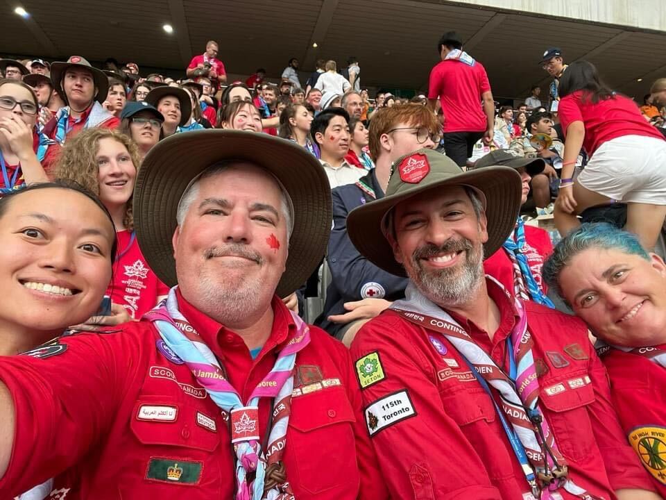 Sean Hume sits at the audience with other Scouts at the Jamboree