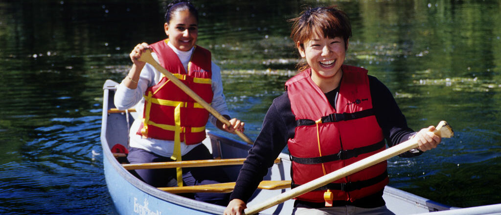 girls canoeing