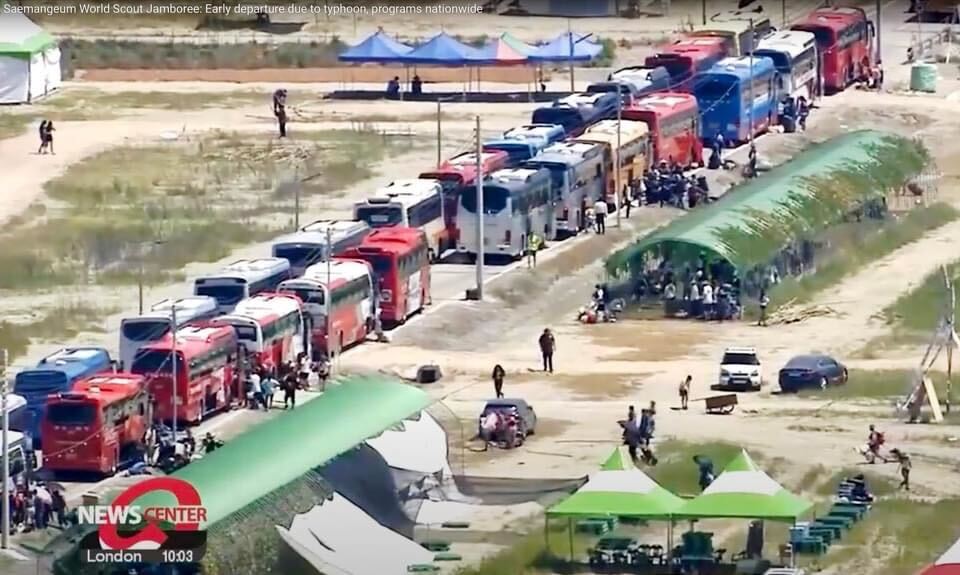 A line of buses wait to evacuate participants at the 25th World Jamboree in South Korea