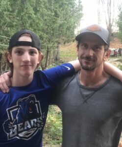 Kohen and Jamin George standing side by side