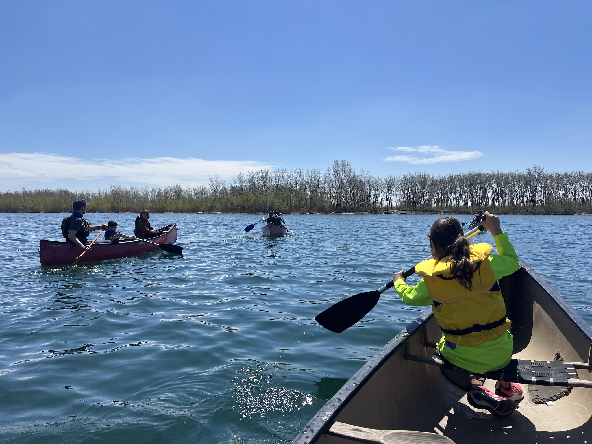 Children canoeing together during an Outward Bound Canada Nature Club for Home Schoolers activity in Toronto.